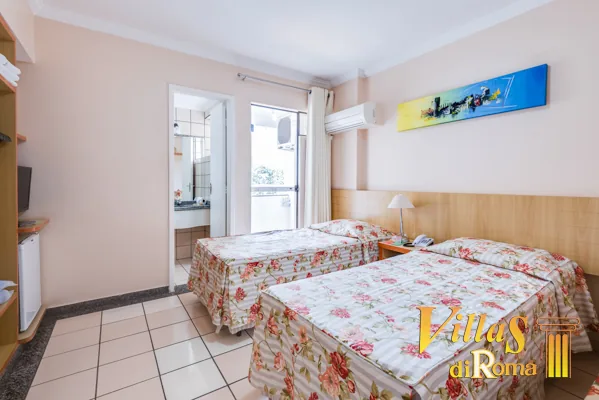 Apartamento do Villas diRoma com camas e varanda
